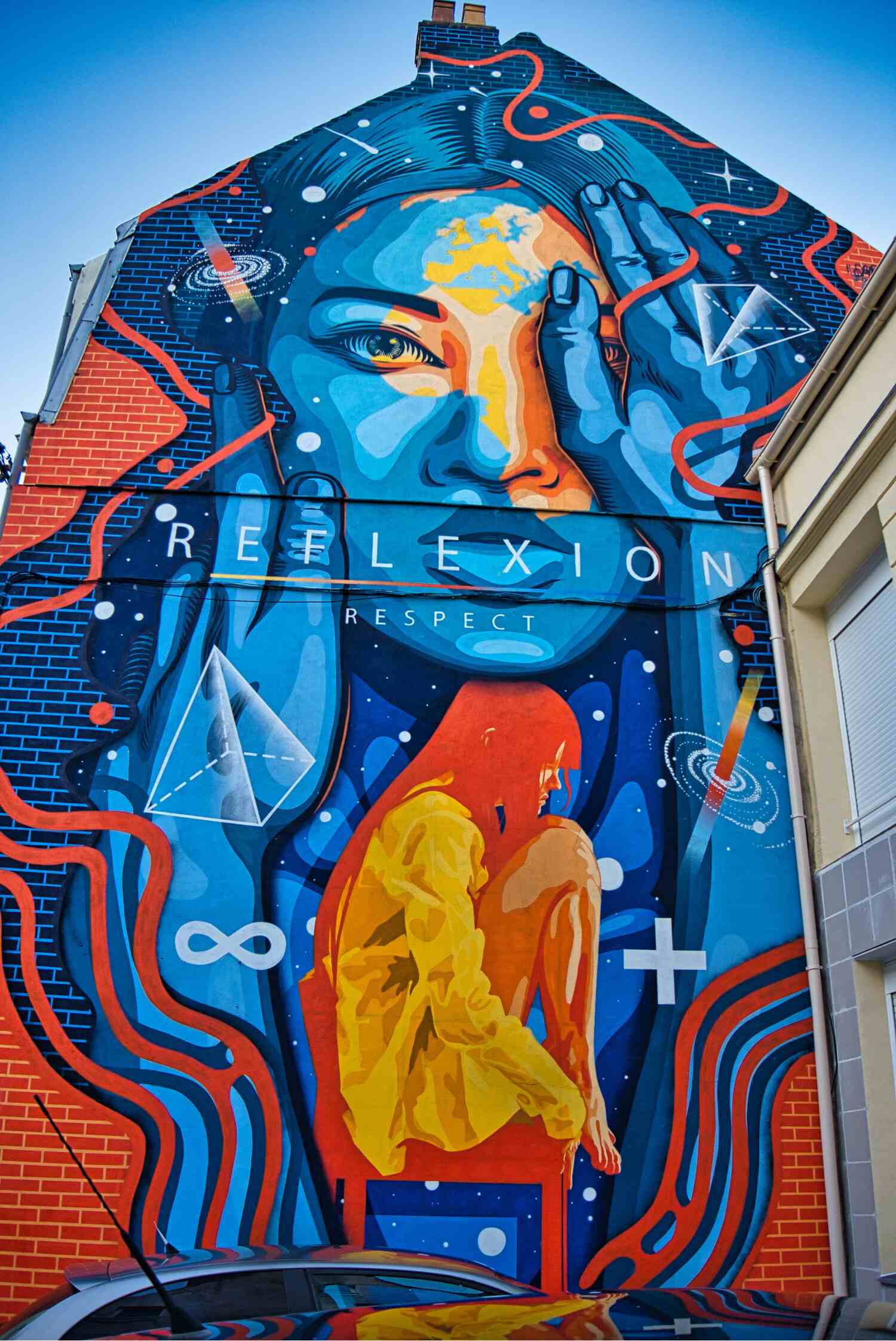 A futuristic, neon-styled painting of a woman with the sides of her face loosely covered by a pair of hands, and various galactic objects dotted around, including galaxies, stars and comets in various shades of greenish-blue, with orange swirls and the words 'REFLEXION RESPECT' printed at the bottom